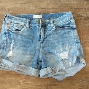 Distressed denim shorts